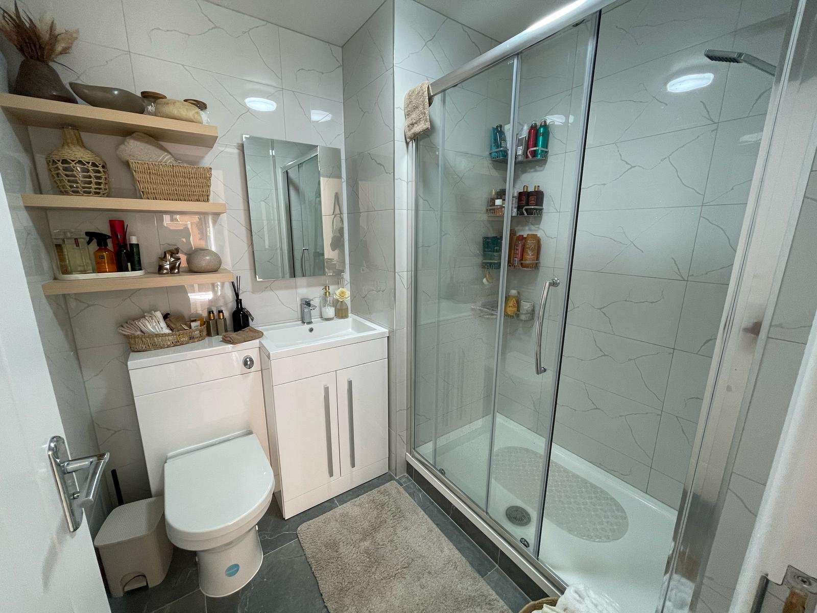 Refurbished bathroom with new suite and tiling