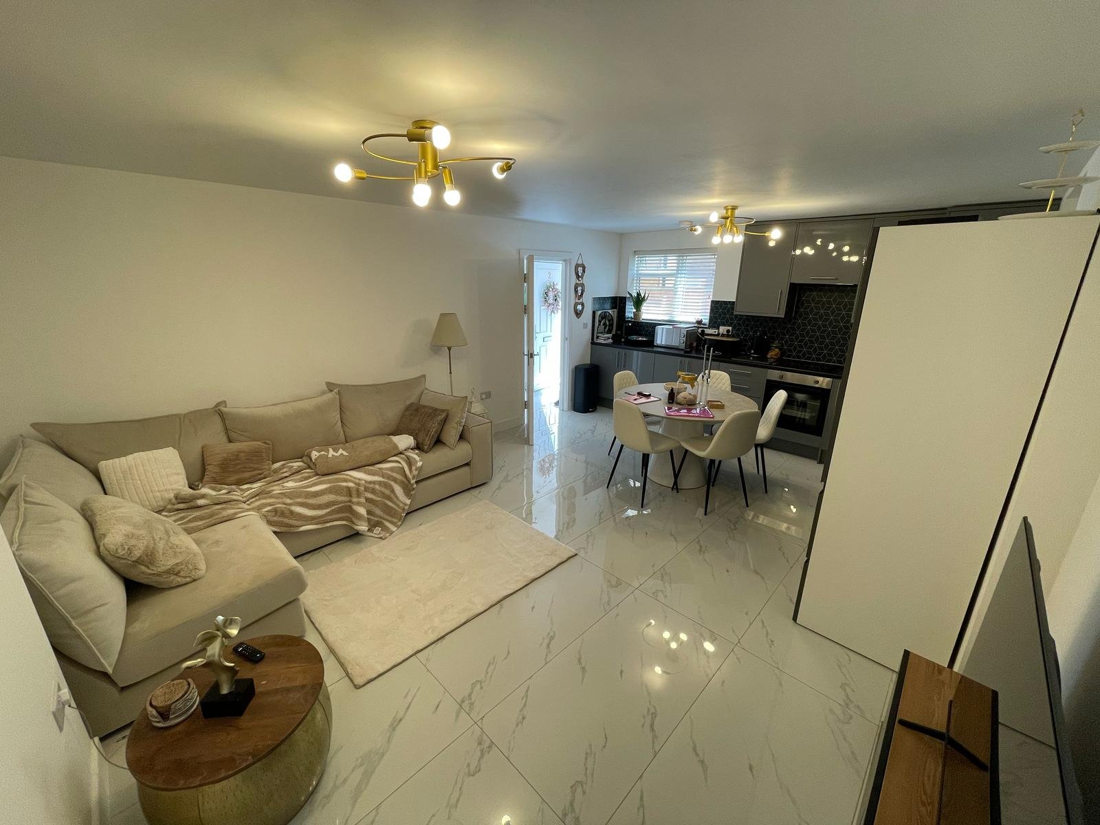 Finished open-plan living and kitchen space