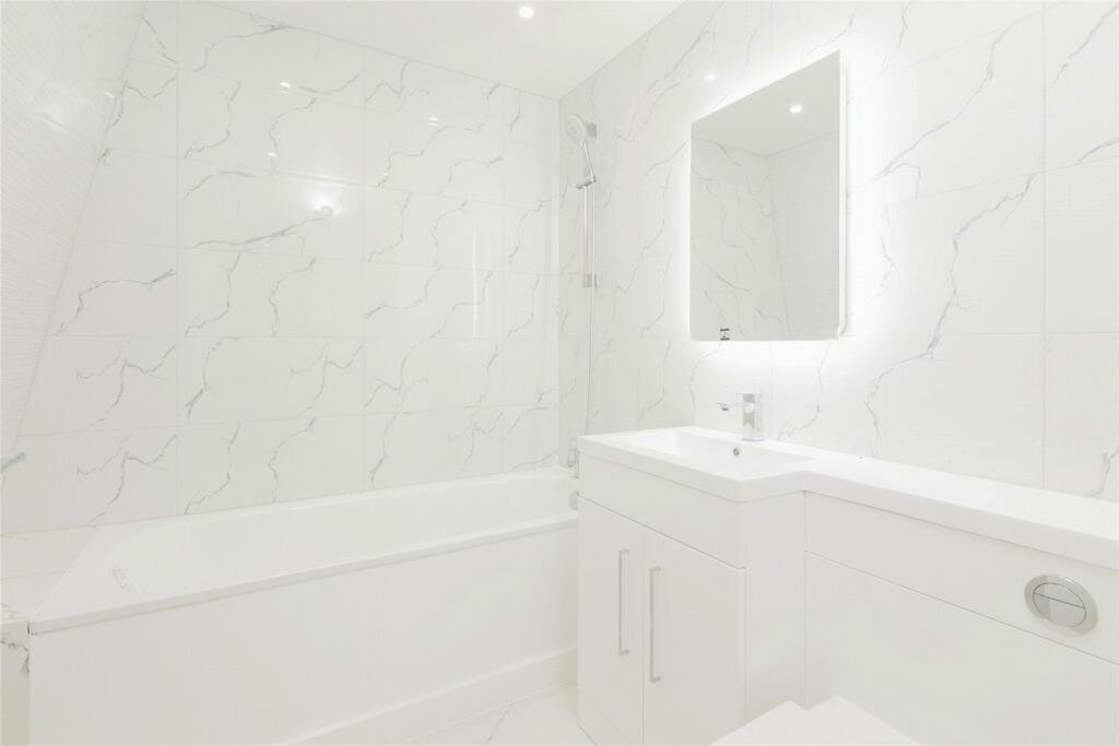 Walk-in shower enclosure and vanity unit