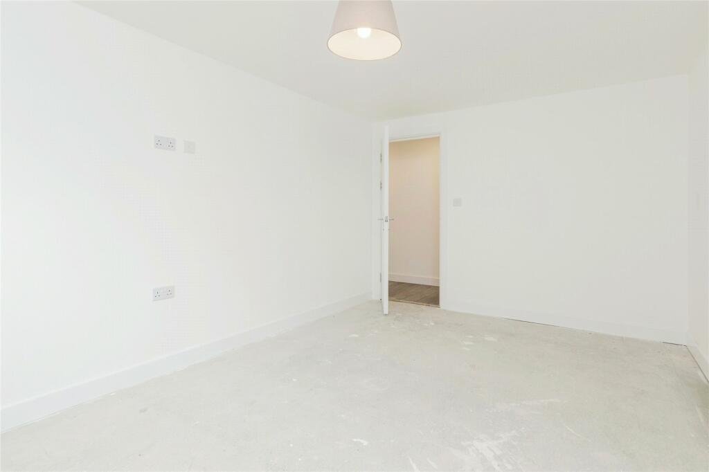 Bare loft space before conversion